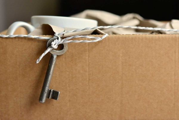 cup, packing box, twine and keys